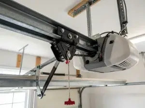 Close-up of a garage door opener gear and chain assembly