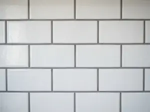 Close-up of grout lines between freshly laid floor tiles