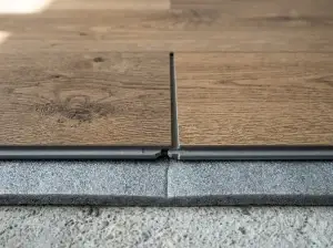 Close-up of interlocking vinyl laminate plank edges