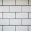Close-up of grout lines between freshly laid floor tiles
