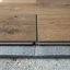 Close-up of interlocking vinyl laminate plank edges